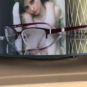 Designoptic women’s half rim eyeglass frames.